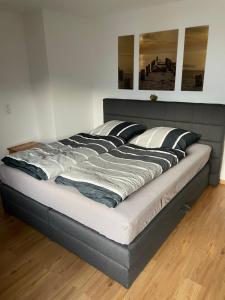 Кровать или кровати в номере Ferienwohnung Bergidyll