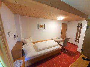 Postel nebo postele na pokoji v ubytování Haus Alpengruß