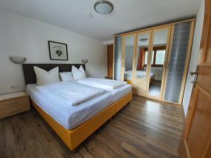 Postel nebo postele na pokoji v ubytování Haus Alpengruß