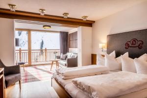 Postel nebo postele na pokoji v ubytování Damülser Hof - Wellness & Spa Superior