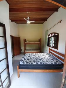 Letto o letti in una camera di Vanuchi Beach Casa Litoral Norte Altre 25 foto