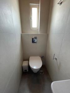 Kúpeľňa v ubytovaní Belou apartment