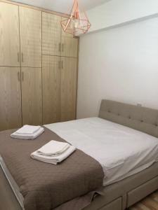 Una cama o camas en una habitación de Modern Luxury Apartment in the heart of Nicosia