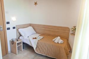 Postel nebo postele na pokoji v ubytování Hotel Costazzurra by Interlux