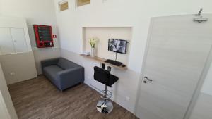 TV a/nebo společenská místnost v ubytování Cabin HOSTEL