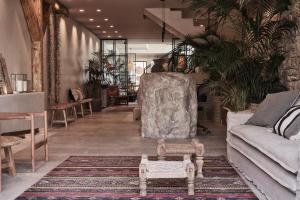 Uma área de estar em Amyth of Mykonos Agios Stefanos