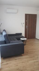 Svetainės erdvė apgyvendinimo įstaigoje Apartament Kąty Rybackie Zaciszna