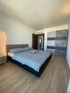 Posteľ alebo postele v izbe v ubytovaní The 9th Floor Apartman + 27 fotografií