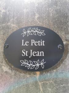 a sign that says le petit st lean at le petit st Jean in Cazouls-d Herault