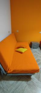 Ένα ή περισσότερα κρεβάτια σε δωμάτιο στο B&B Nausicaa