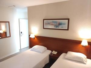 Postel nebo postele na pokoji v ubytování Hotel Sao Mamede Estoril