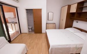 Postel nebo postele na pokoji v ubytování Apartment MERI (4172)