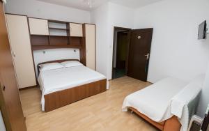 Postel nebo postele na pokoji v ubytování Apartment MERI (4172)