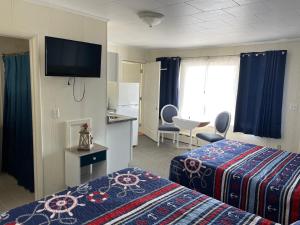 Katil atau katil-katil dalam bilik di Pure Paradise Resort