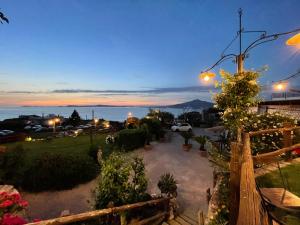 a view of a parking lot at night at L'antica Pigna Chateau in Vico Equense