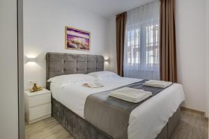 Postel nebo postele na pokoji v ubytování Villa Corcovado