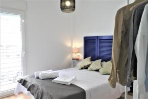 Postel nebo postele na pokoji v ubytování Bodega Trasbolsa 2