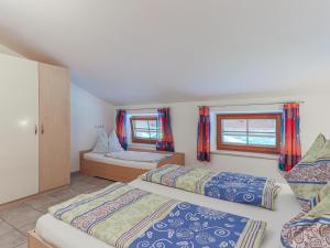 A bed or beds in a room at Koglbauer - Apartment Nr 4