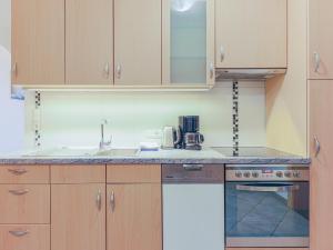 A kitchen or kitchenette at Koglbauer - Apartment Nr 4