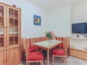 A television and/or entertainment centre at Koglbauer - Apartment Nr 4