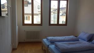 Posteľ alebo postele v izbe v ubytovaní Argentieri Guesthouse