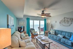 a living room with a couch and a ceiling fan at Cozy Middle Bass Island Getaway On Lake Eerie! in Put-in-Bay