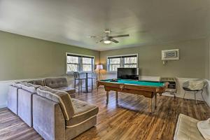 a living room with a pool table in it at Peaceful Long Pond Home with Private Hot Tub! in Long Pond