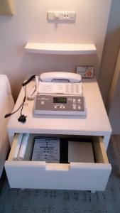 a desk with a scale on top of it at Shibuya Excel Hotel Tokyu in Tokyo