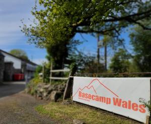 a sign for a house with a graph on it at Basecamp Wales in Llanllyfni