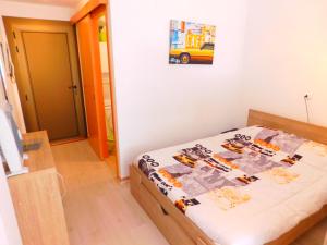 Кровать или кровати в номере GMID IMMO Apartment Castell Joncar