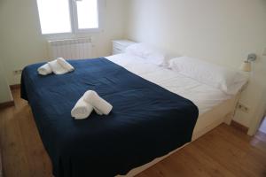 Posteľ alebo postele v izbe v ubytovaní Sky Beach Can Picafort