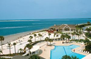 A view of the pool at 1314 Pelican Watch - Seabrook Island - Beachfront 5 Star Condo - Fido Friendly or nearby