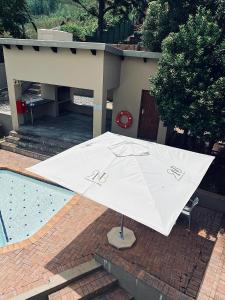 Bazén v ubytování RNB Guesthouse nebo v jeho okolí