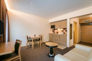 Postel nebo postele na pokoji v ubytování Hotel Bon Repos
