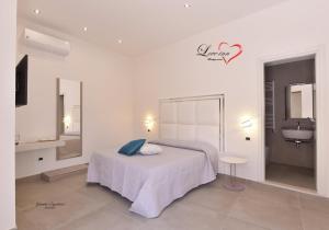 Posteľ alebo postele v izbe v ubytovaní Love inn