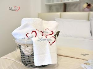 Posteľ alebo postele v izbe v ubytovaní Love inn