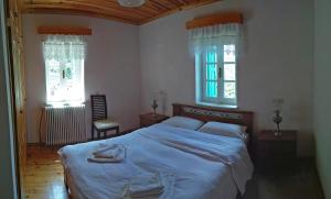 Postel nebo postele na pokoji v ubytování Guesthouse Iro