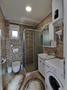 Ein Badezimmer in der Unterkunft Apartmani VS Lux