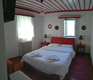 Postel nebo postele na pokoji v ubytování Guesthouse Iro