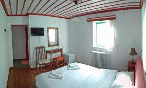Postel nebo postele na pokoji v ubytování Guesthouse Iro