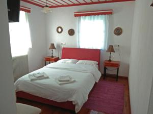 Postel nebo postele na pokoji v ubytování Guesthouse Iro