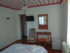 Postel nebo postele na pokoji v ubytování Guesthouse Iro