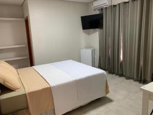 TV a/nebo společenská místnost v ubytování Hotel Kanaan