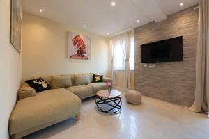 TV a/nebo společenská místnost v ubytování Apartment Glory