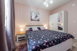 Postel nebo postele na pokoji v ubytování Apartment Glory