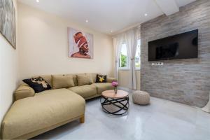 TV a/nebo společenská místnost v ubytování Apartment Glory