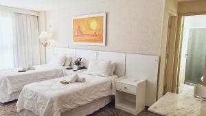 Cama ou camas em um quarto em KS Beach Hotel