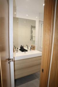 Koupelna v ubytování Apartamento Orzán playa + 32 fotografií