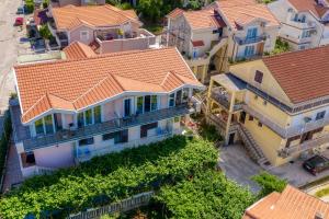 an aerial view of a house with orange roofs at Porto View Three-Bedroom Duplex in Tivat +18 photos