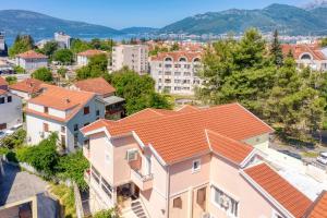 arial view of a city with houses at Porto View Three-Bedroom Duplex in Tivat